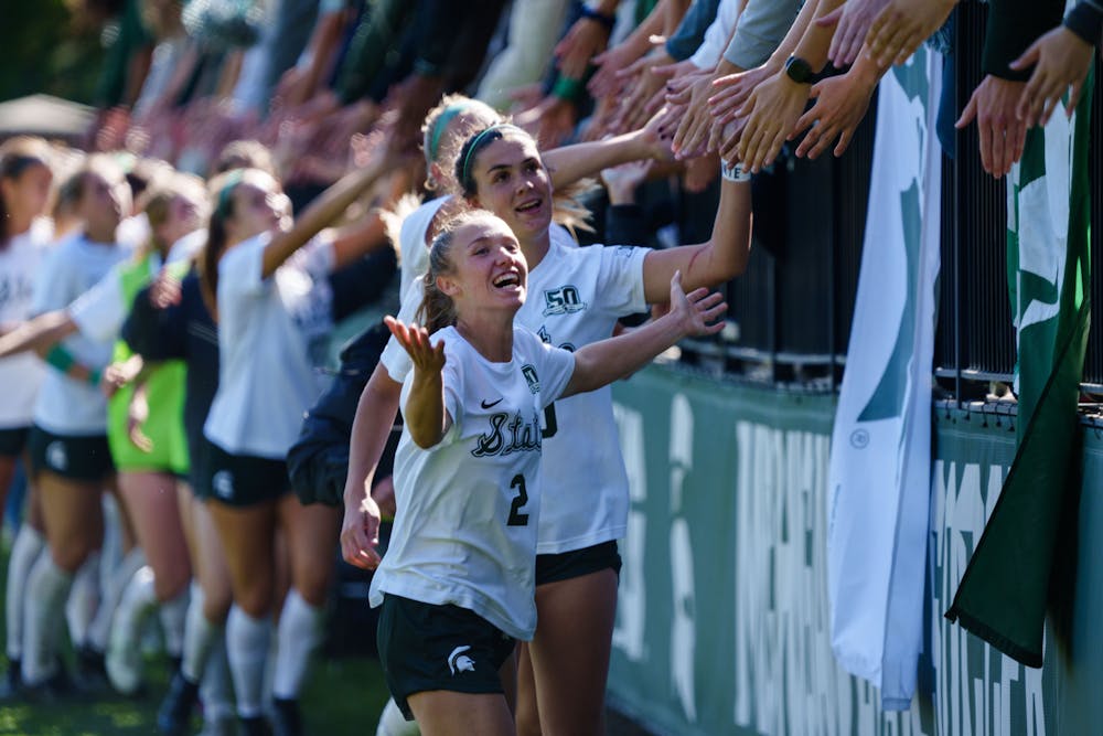 <p>Michigan State senior forward Lauren Debeau celebrates a win against University of Michigan at DeMartin Stadium on Oct. 9, 2022. The Spartans Defeated the Wolverines 2-0.﻿</p>