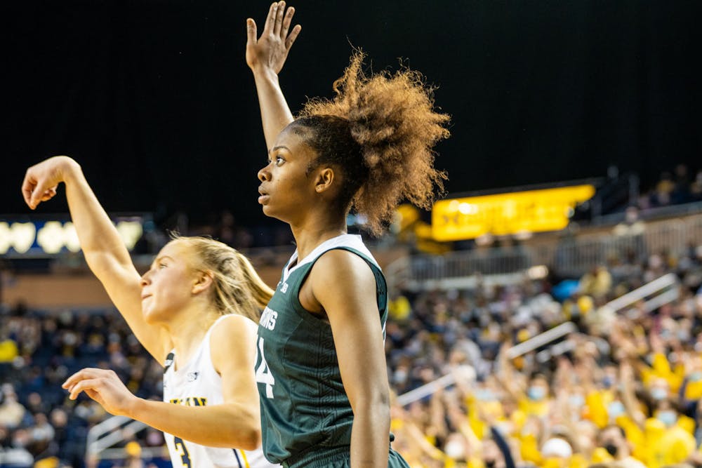 <p>Senior guard Nia Clouden (24) watches the Wolverine&#x27;s shot after attempting to block it at the Crisler Center on Feb 24., 2022.</p>