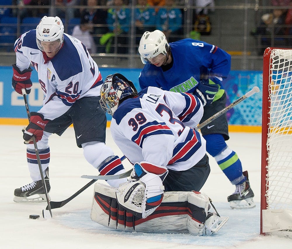 	<p><span class="caps">USA</span> defenseman Ryan Suter (20) helps goalie Ryan Miller (39) protect the goal on a shot by Slovenia forward Ziga Jeglic (8) during the third period in a men&#8217;s hockey game at the Winter Olympics in Sochi, Russia, Sunday, February 16, 2014. <span class="caps">USA</span> defeated Slovenia 5-1. (Harry E. Walker/MCT)</p>