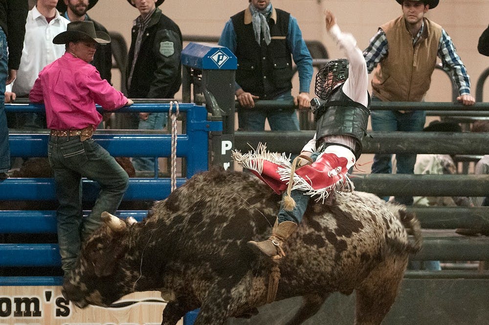 	<p>Agriculture industries sophomore John Miller competes in a bull riding competition during the 45th annual Spartan Stampede Rodeo on Feb. 15, 2014, at <span class="caps">MSU</span> Pavilion. Miller has been riding since he was eight. </p>