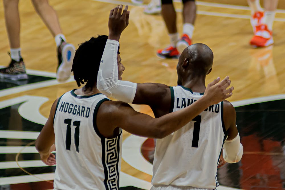 <p>Freshman guard AJ Hoggard and Redshirt senior guard Josh Langford embrace during the Spartans&#x27; 81-72 victory against the Fighting Illini.</p>