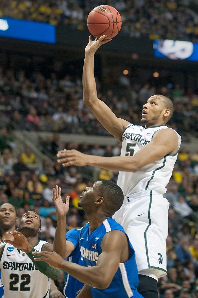 	<p>Junior center Adreian Payne attempts a shot in the third round of the <span class="caps">NCAA</span> Tournament. The Spartans defeated the Tigers, 70-48, Saturday, March 23, 2013, at The Palace of Auburn Hills in Auburn Hills, Mich. Justin Wan/The State News</p>