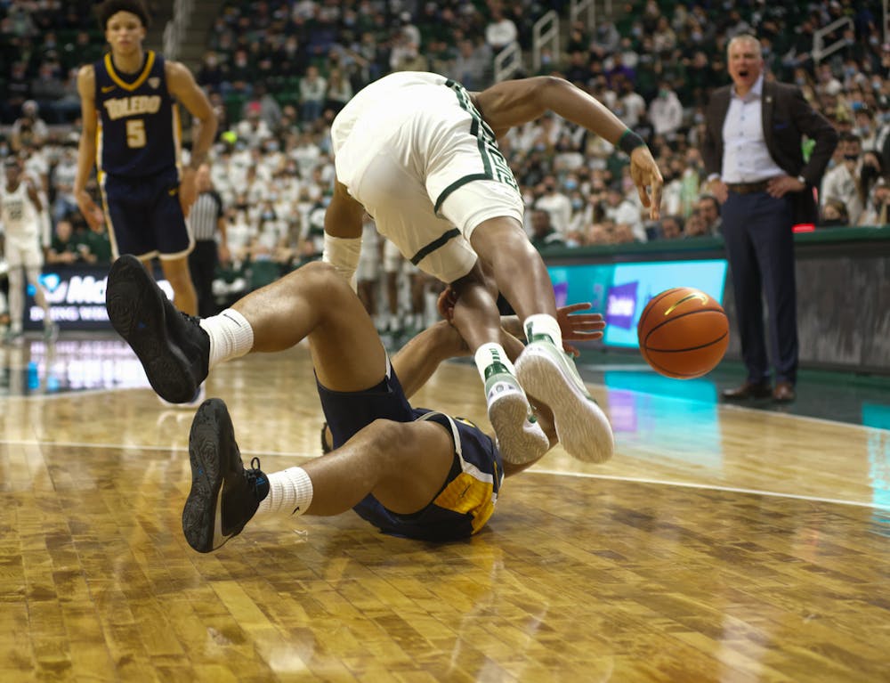 <p>Player takes a tumble during the matchup against Toledo. </p>