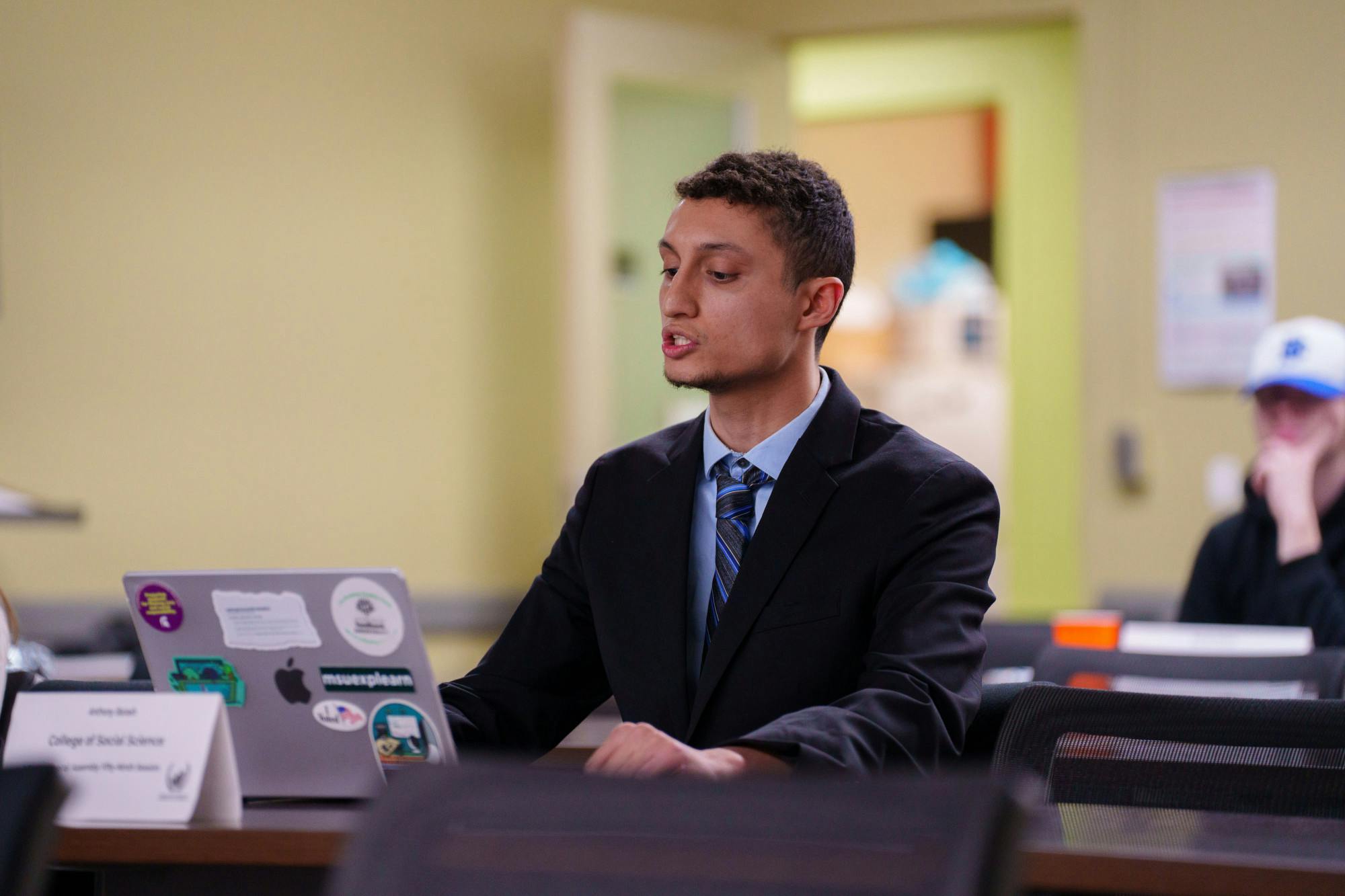 <p>An ASMSU representative presents on the importance of clean water on campus during a General Assembly meeting, held at the Student Services building on Feb. 2, 2023.</p>