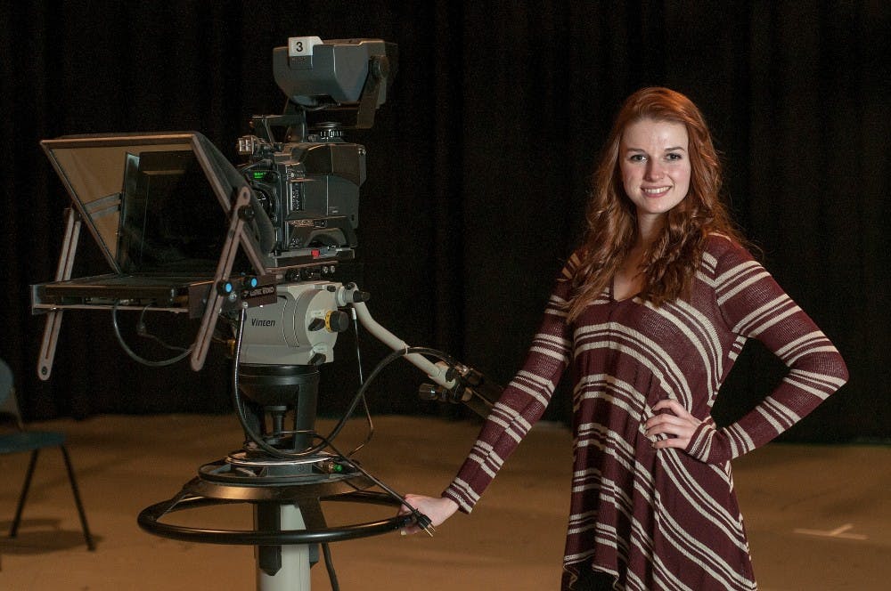 <p>Media and information freshman Anna Young poses for a portrait Jan. 12, 2015, in the Communication Arts building. Young works as a producer for a sitcom called The ShoW. Kelsey Feldpausch/The State News.</p>