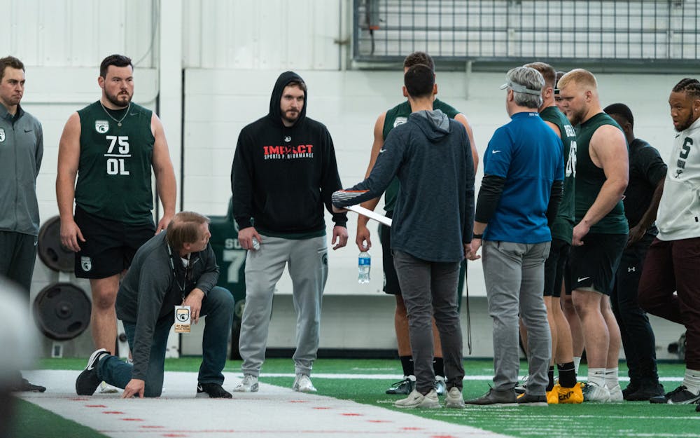 <p>Michigan State Football players getting instructed on the 40 yard dash during Pro Day, on Mar. 16, 2022 at the Duffy Daugherty Indoor Football Building.</p>