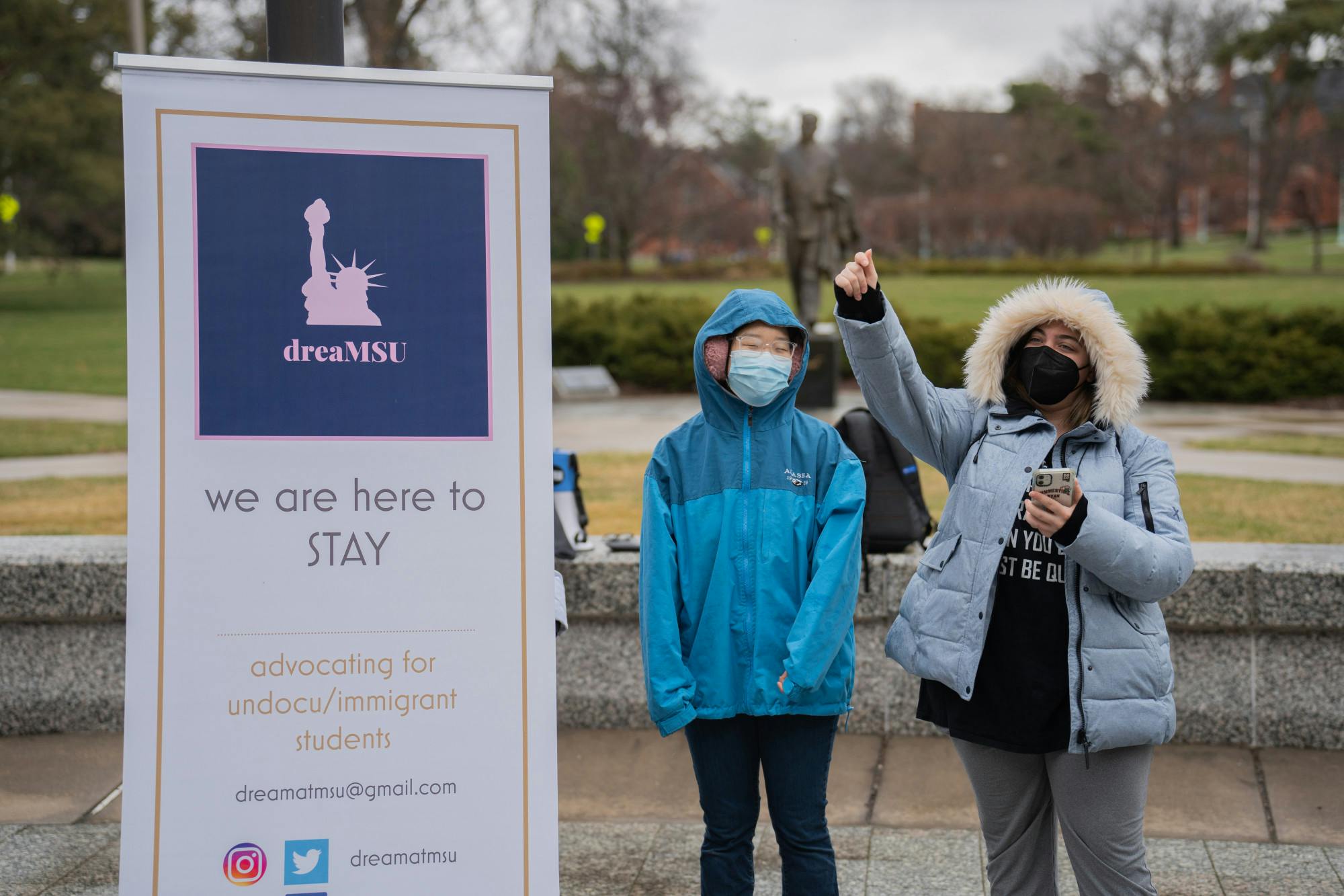 <p>DreaMSU members lead protestors in a chant. DreaMSU had a rally in front of the Hannah Administration Building in support of immigrant students on April 8, 2022.</p>