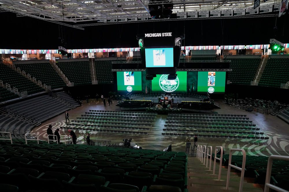 Workers set up for MSU commencements at Breslin Center on the morning of May 5, 2023. 