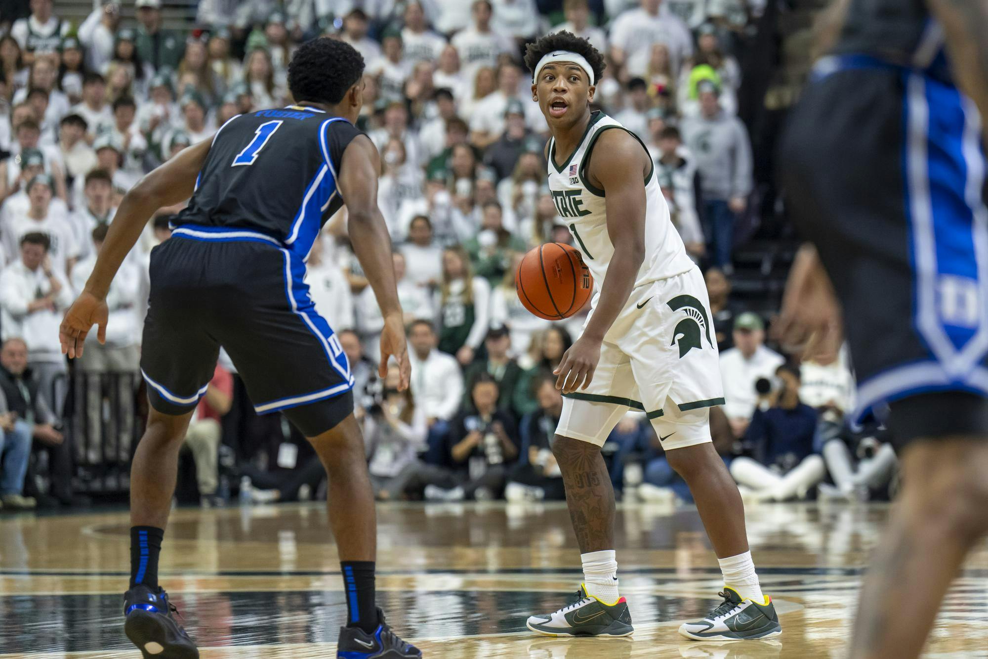 Michigan State redshirt sophomore and guard Jeremy Fears Jr.  (1) moves the ball up court against Duke at the Breslin Center in East Lansing, Michigan on Saturday, Dec. 6, 2025. 