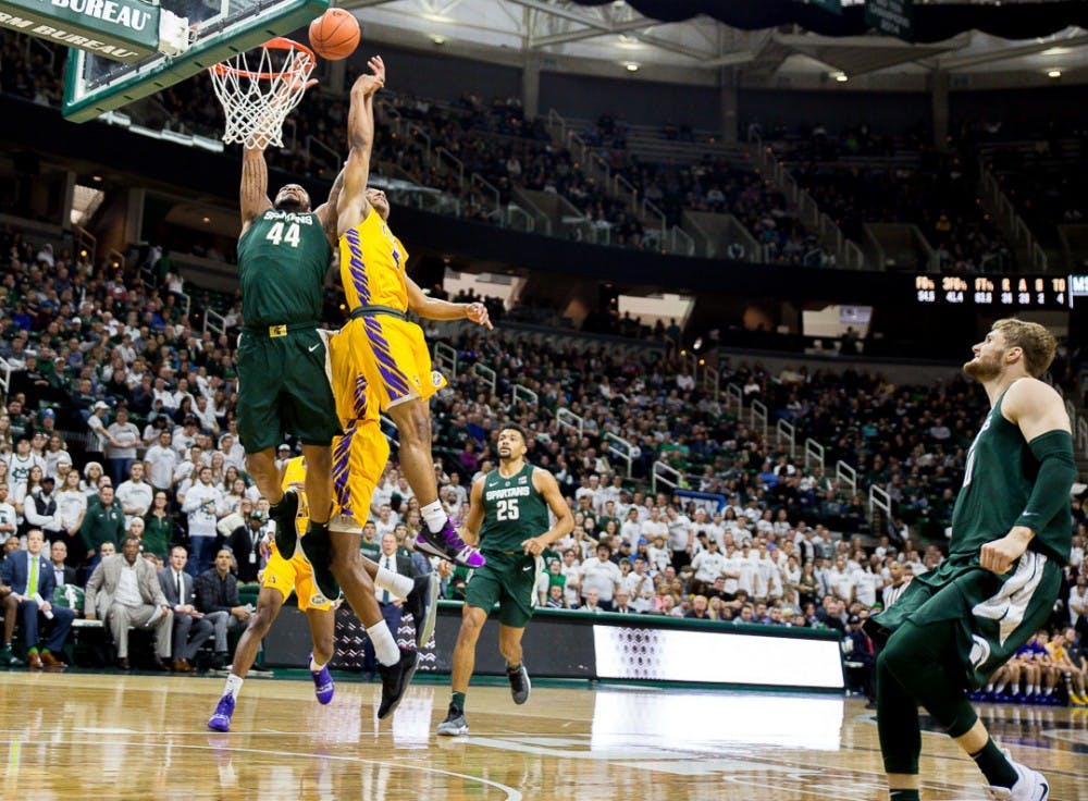 Junior forward Nick Ward (44) goes up for a layup during the game against Tenessee Tech on Nov. 18, 2018 at the Breslin Center. The Spartans beat the Golden Eagles, 101-33.