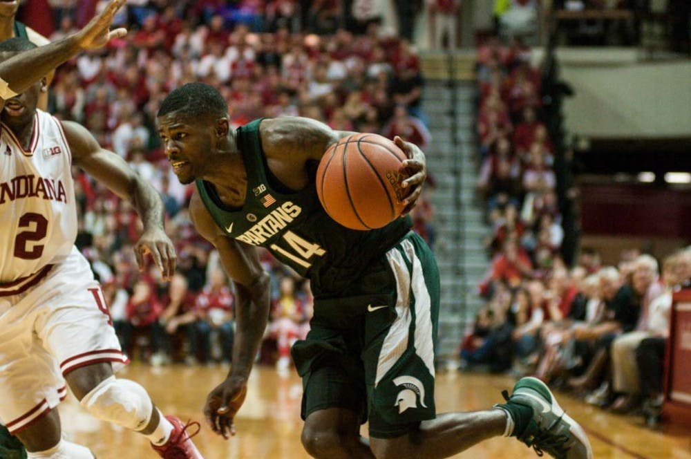 Senior guard Eron Harris (14) drives the ball toward the basket during the second half of the men?s basketball game against Indiana on Jan. 21, 2017 at Assembly Hall. The Spartans were defeated by the Hoosiers, 75-82.