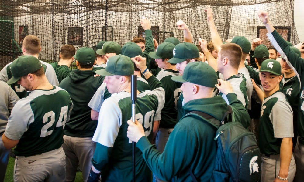 The Spartans come together to finish their practice on Feb. 3, 2017 at McLane Baseball Stadium at John H. Kobs Field. The Spartans are preparing for opening day on Feb.17, 2017.