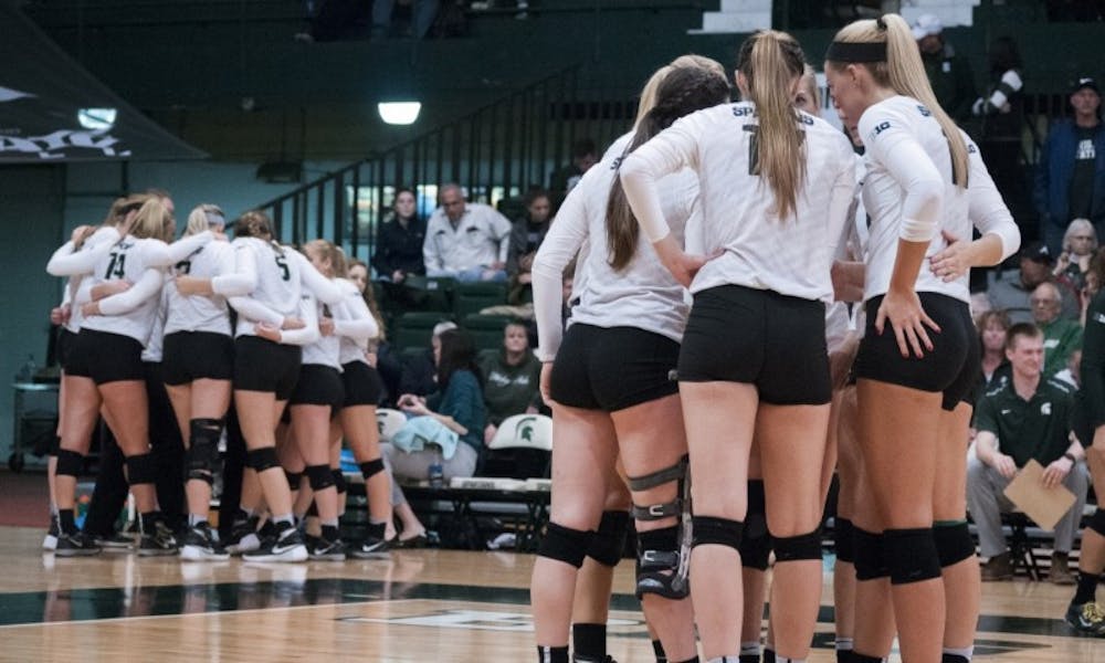 <p>The Spartans huddle up for a timeout during the game against Arizona on Dec. 3, 2016 at Jenison Field House. The Spartans were defeated by the Wildcats, 3-2.</p>