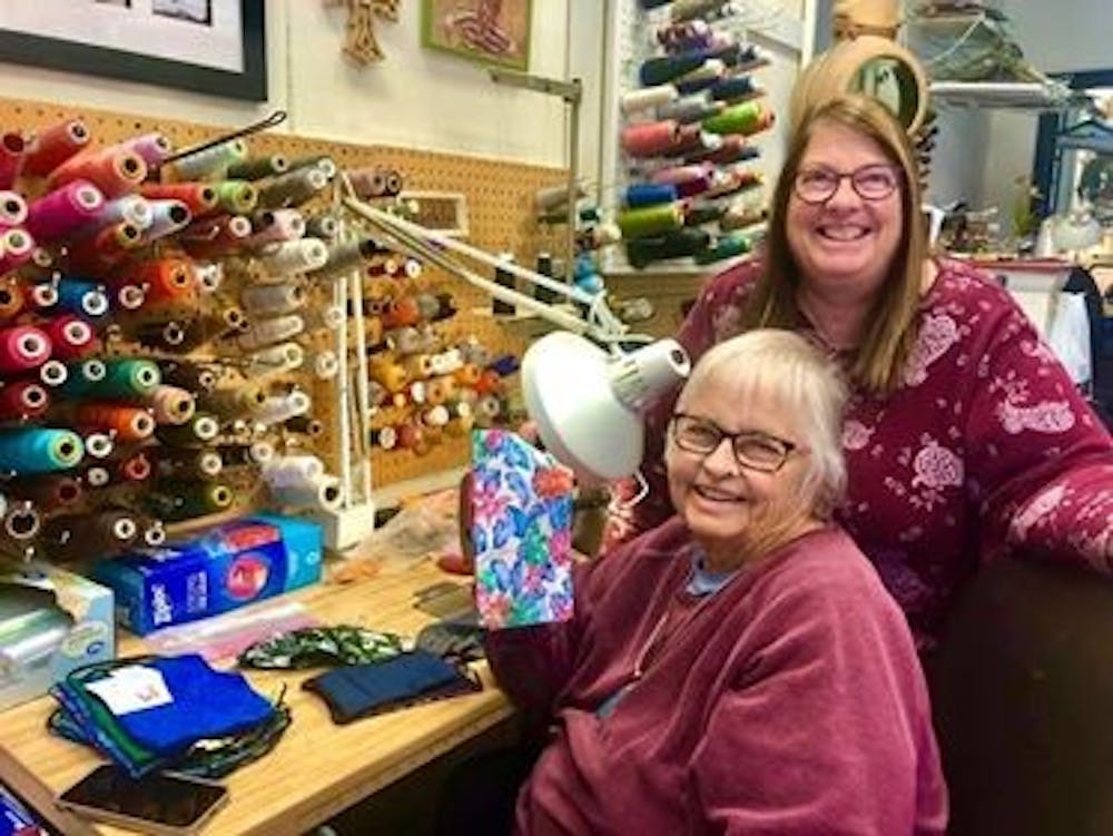 <p>Haslett mother-daughter seamstress duo Carolyn Thurman (bottom) and Kelly Wheaton (top). Photo courtesy of Kelly Wheaton.</p>