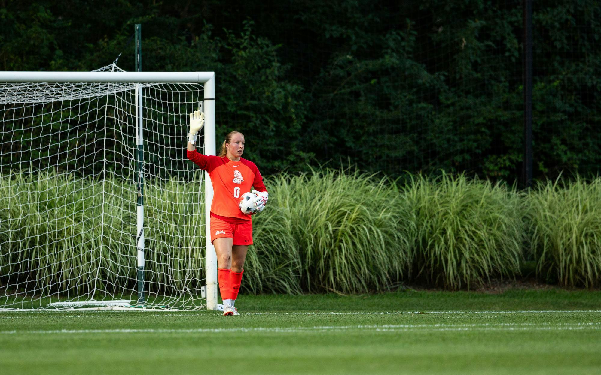 <p>Michigan State So. G, Noelle Henning (0), saves a shot on goal and waves to her team to move up the field in DeMartin Stadium in East Lansing, Mich., on Aug. 12, 2026.</p>