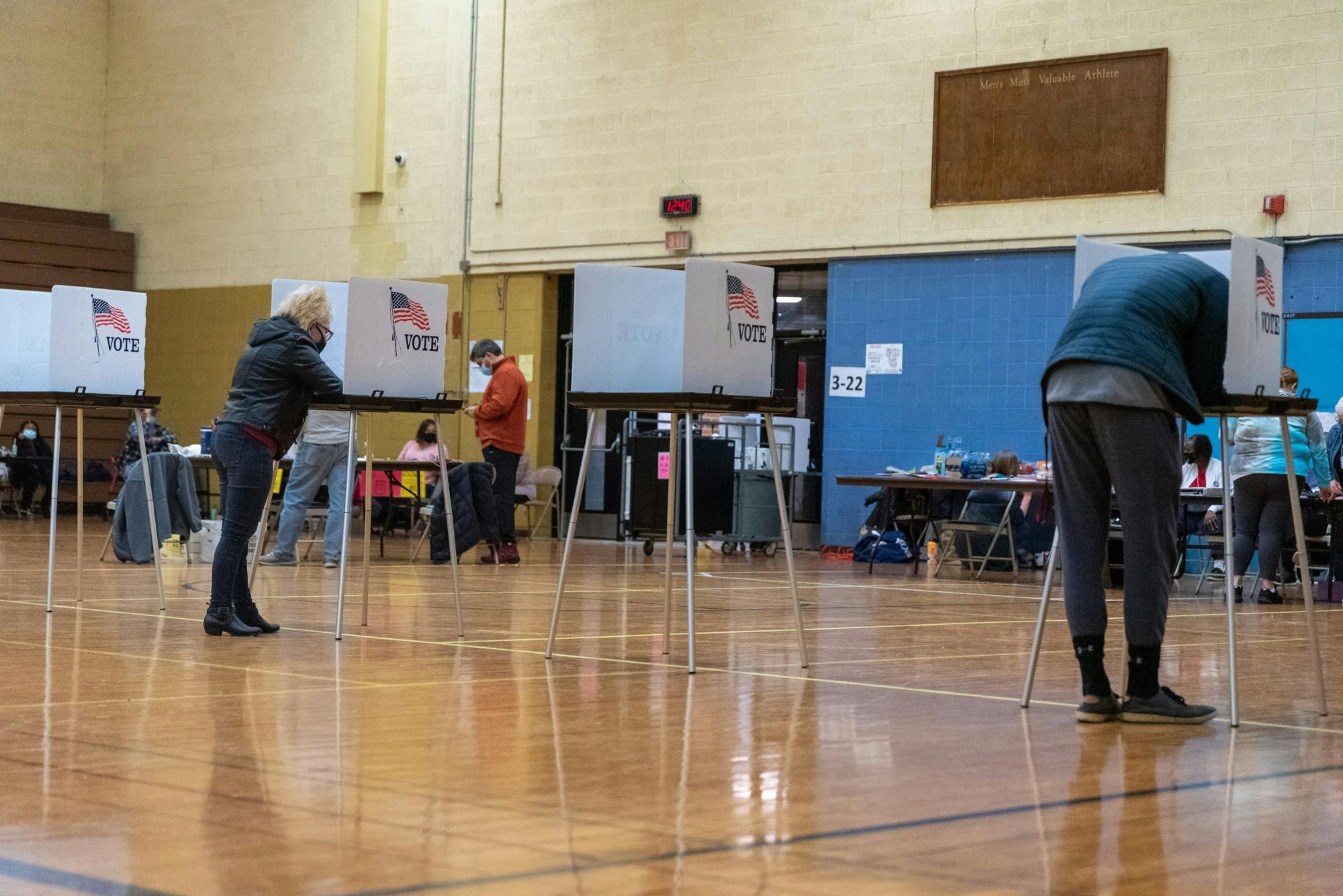 <p>Voters at Southside Community Center polling location filling out ballots Tuesday, Nov. 3, 2020.</p>