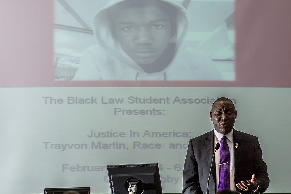 <p>Attorney and Tallahassee, Tenn., resident Benjamin Crump speaks about the roles and issues that young lawyers face in fighting against laws such as "Stand Your Ground" on Feb. 25, 2014, at Cooley Law School. Crump represented the family of Trayvon Martin during the George Zimmerman trial. Casey Hull/The State News</p>