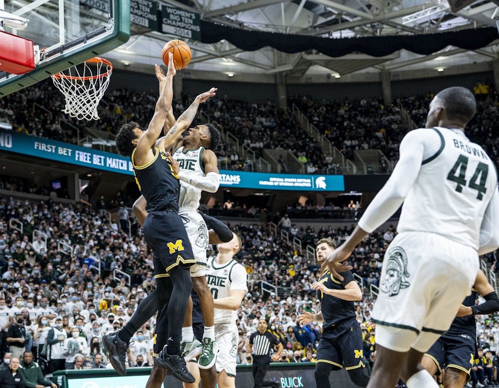 <p>Spartans’ junior guard Tyson Walker (2) makes a shot over the Wolverines in MSU’s game against the University of Michigan at the Breslin on Saturday, Jan. 29, 2022. </p>
