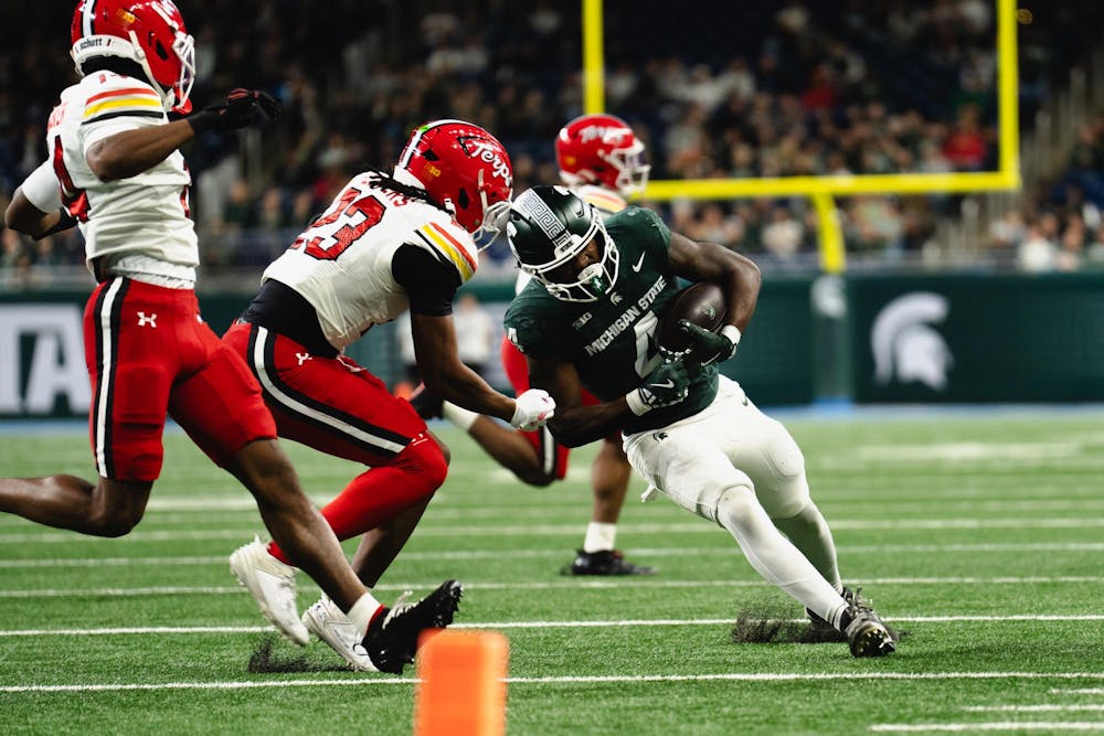 <p>MSU sophomore running back Brandon Tullis (7) runs the ball down field versus Maryland at the Ford Field Stadium in Detroit, MI, on Nov. 29, 2025.</p>