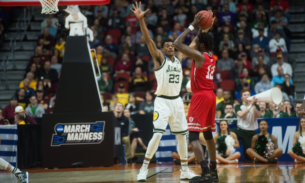 Sophomore forward Xavier Tillman blocks a player during the game against Bradley at Wells Fargo Arena March 21, 2019. The Spartans trail the Braves, 35-34, at halftime.