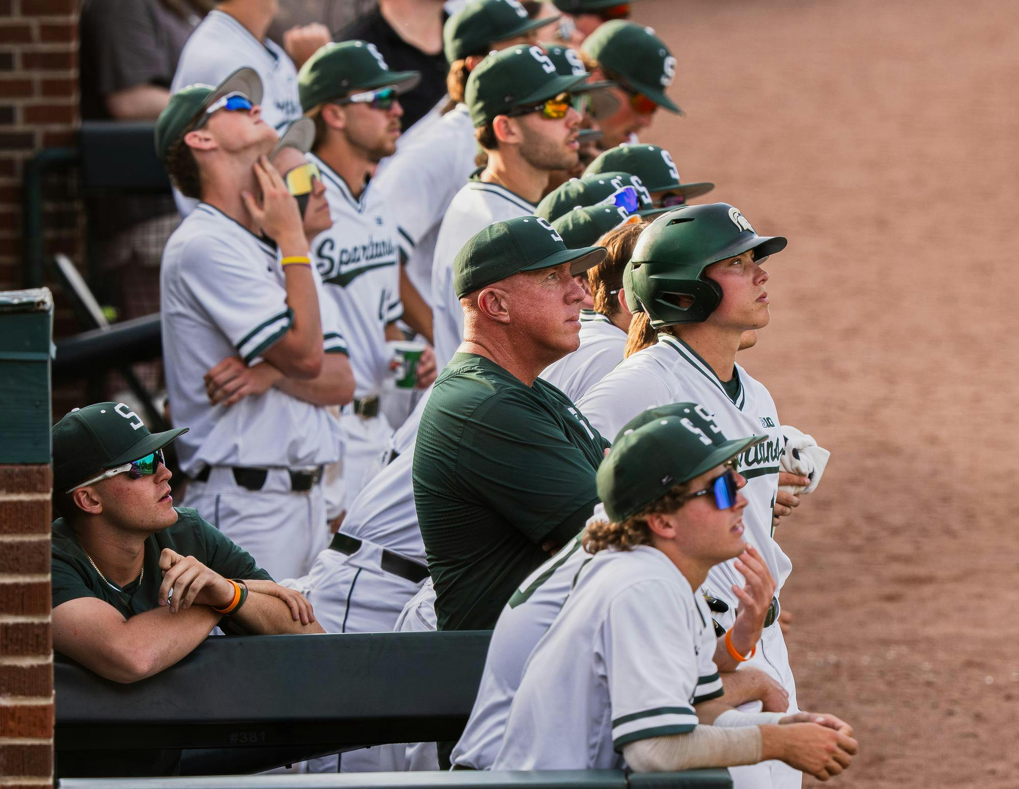 <p>The Michigan State dugout watches a fly ball at McLane Stadium on May 16, 2025.</p>