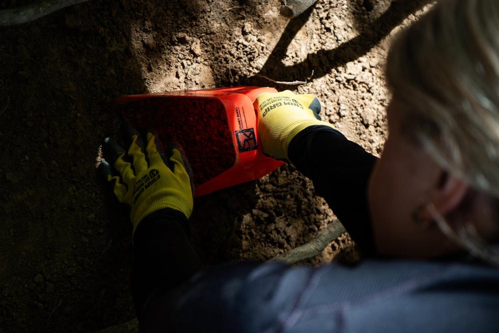 <p>Gabrielle Moran-O'Dell, a third-year graduate student and student campus archaeologist for MSU's Campus Archaeology Program, excavates the old observatory site in East Lansing, Mich., on June 15, 2026.</p>