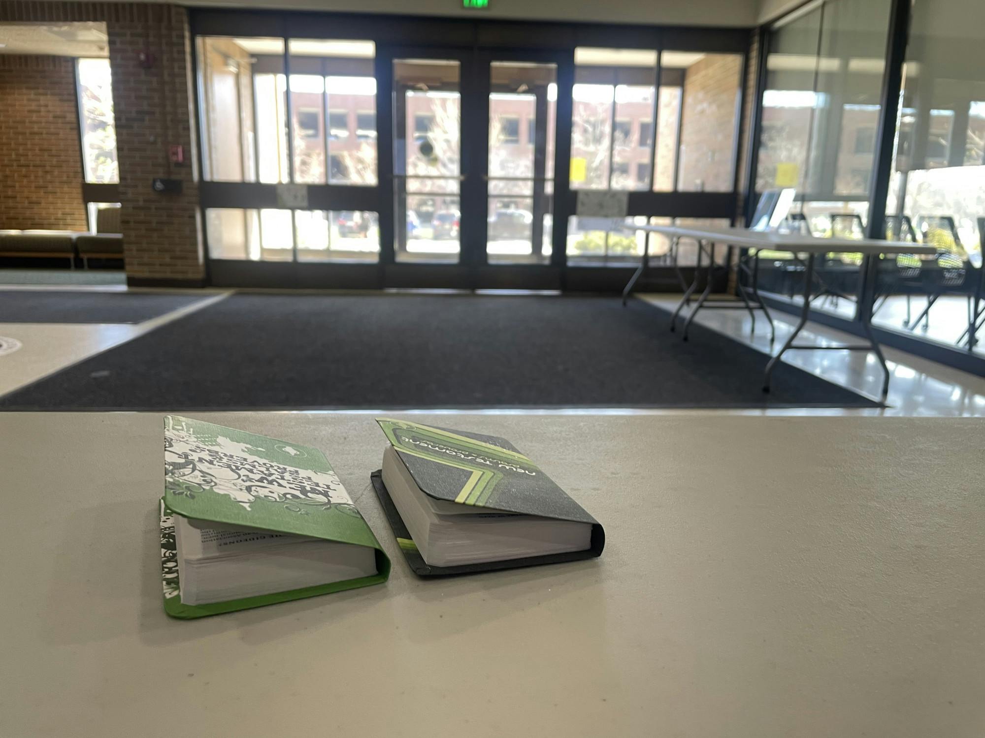 Discarded bibles at the Communication Arts and Sciences building on April 13, 2023. 