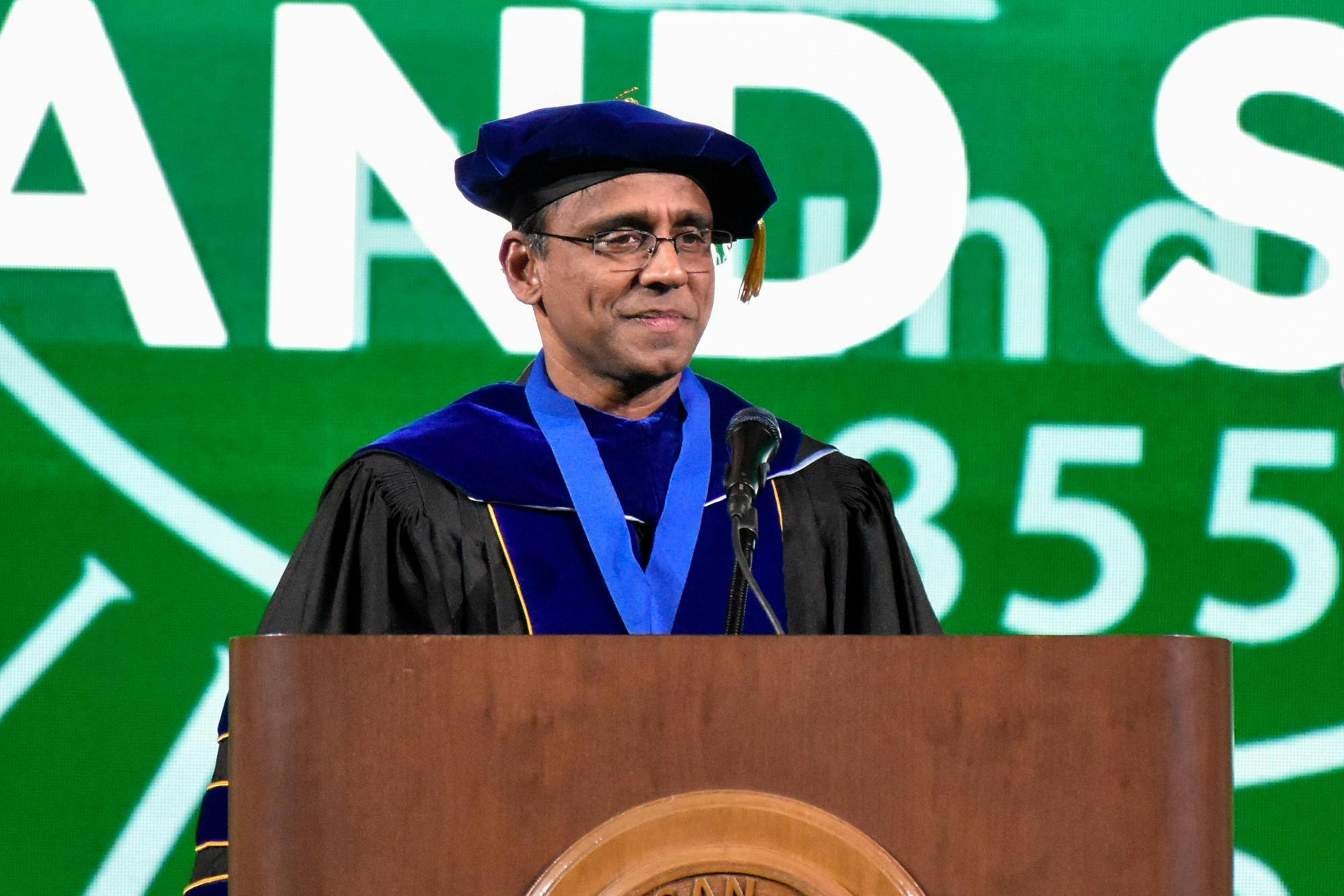 Dean Prabu David speaks at the College of Communication Arts and Sciences commencement ceremony on May 5, 2023.