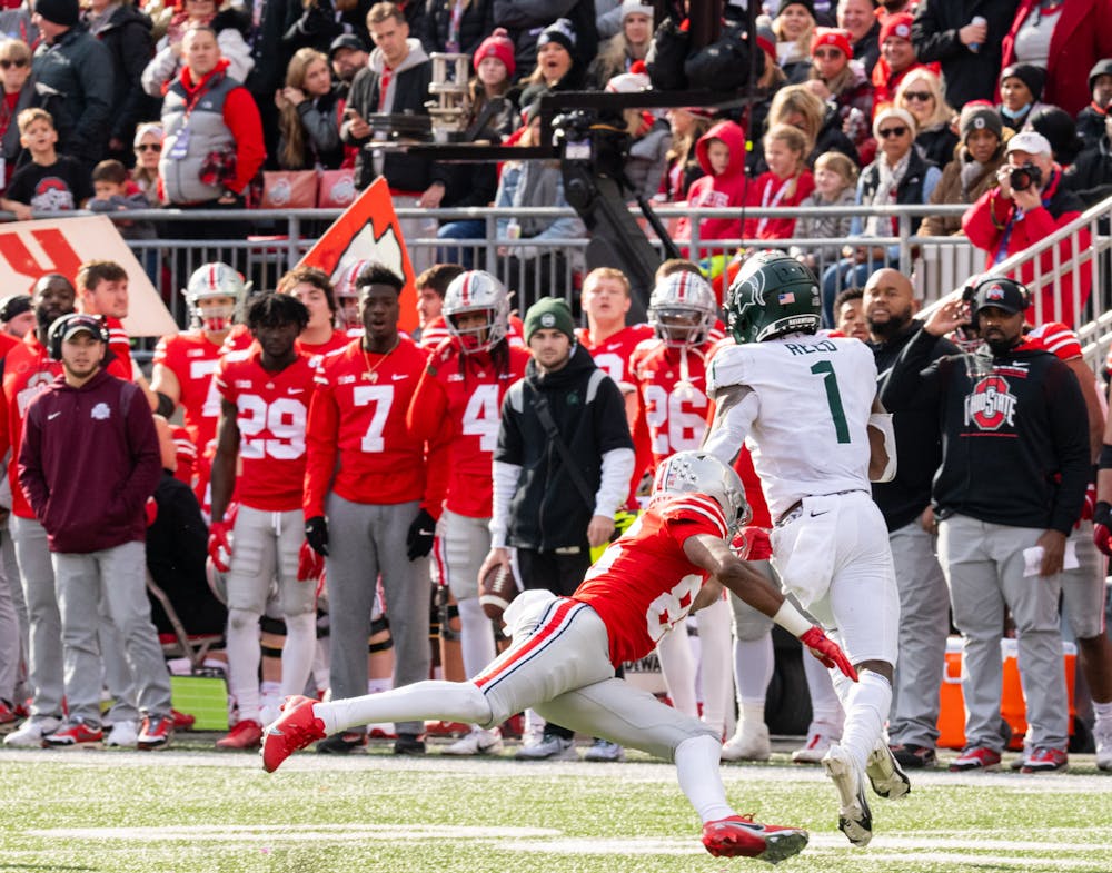 <p>Michigan State&#x27;s Jayden Reed (1) avoids being tackled during Michigan State&#x27;s loss to Ohio State on Nov. 20, 2021.</p>