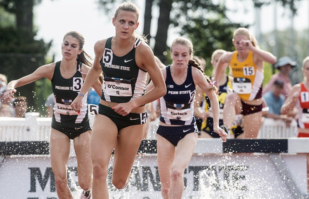 <p>Senior Leah O'Connor (right) and junior Katie Landwehr compete in the steeplechase competition at the Big Ten Conference Championships May 16, 2015 at Ralph Young Field. Wyatt Giangrande/ State News</p>