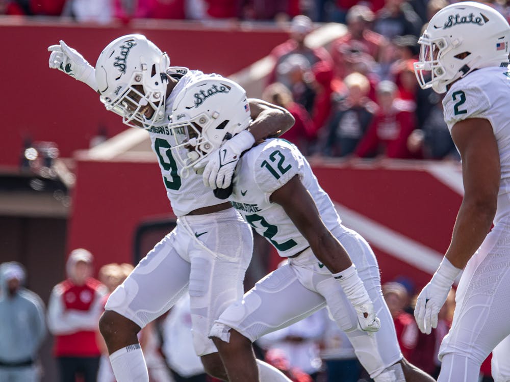 <p>Michigan State senior and junior cornerbacks, Ronald Williams Jr. and Chester Kimbrough, celebrate a change of possession. The Spartans found a way to hold on against the Hoosiers with a 20-15 win scraping to their first 7-0 start since 2015 on Oct. 16, 2021.</p>