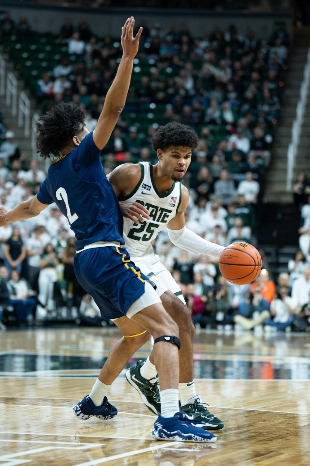 <p>Senior forward Malik Hall backs his way into the paint during the Spartans' 73-55 win over Northern Arizona on Nov. 7, 2022.</p>