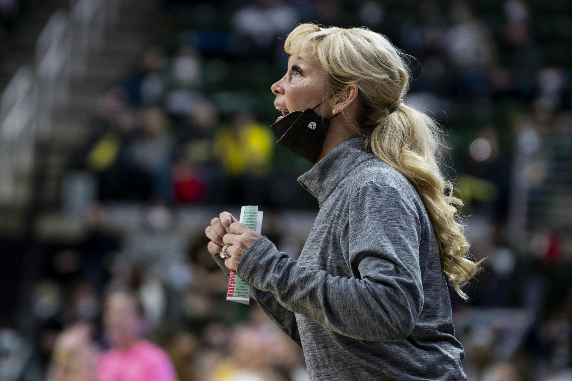<p>Head women's basketball coach Suzy Merchant talks to the players during the game against Michigan on Feb. 10, 2022, at the Breslin Center. The Spartans defeated the Wolverines 63-57.</p>