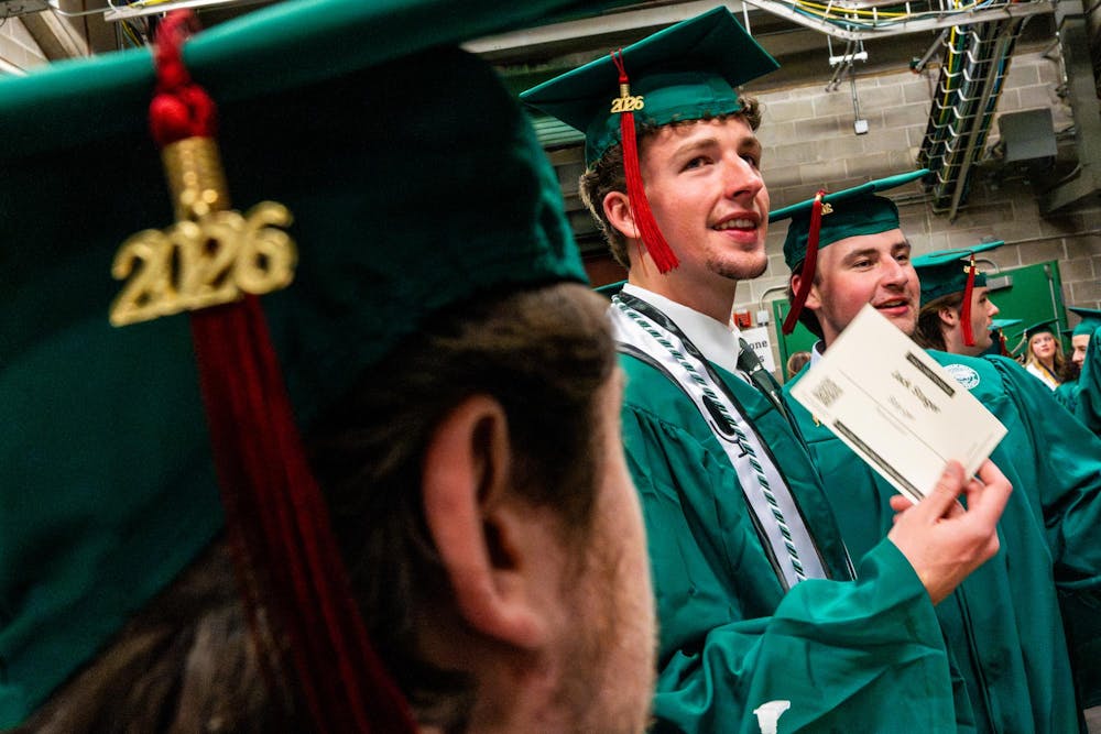 Graduates wait before the Michigan State University College of Communication Arts and Sciences graduation ceremony at the Breslin Student Events Center on Michigan State University’s campus in East Lansing, Mich., on Friday, May 1, 2026.