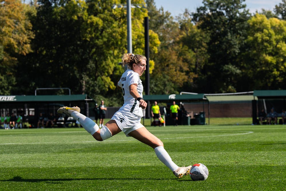 <p>MSU graduate student Celia Gaynor (15) kicks the ball at DeMartin Soccer Stadium on Oct. 1, 2023.</p>