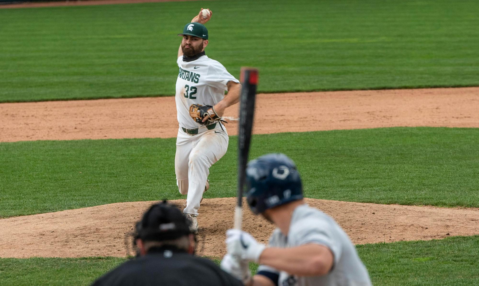 Zach Iverson pitches to Penn State's Curtis Robison in the top of the eighth inning. The Spartans excelled against the Nittany Lions and won 7-4 at McLane Baseball Field on April 9, 2021.