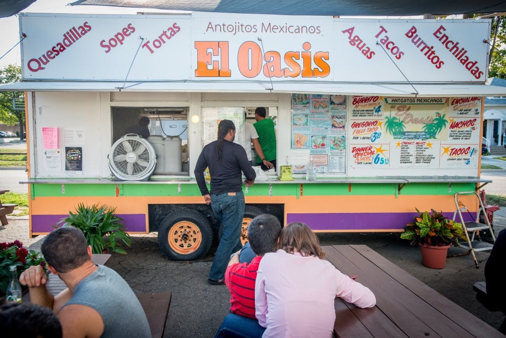 <p>The El Oasis trailer is pictured on Aug. 31, 2017 at El Oasis at 2501 E. Michigan Ave. In Lansing. Lansing resident Ralph Vandervlught has been making complaints about the El Oasis truck after moving right next to it in July. El Oasis has put up a petition to keep their truck's location on Michigan Avenue.</p>
