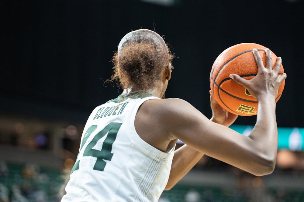 <p>Senior guard Nia Clouden (24) prepares to pass the ball. MSU lost to Maryland at the Breslin Center 67-62 on Thursday, Feb. 3, 2022.</p>