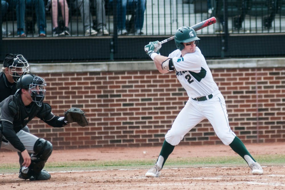 Sophomore infielder Marty Beaching (2) looks to hit the ball during the game against Western Michigan University on March 28, 2017 at McLane Stadium at Kobs Field. The Spartans were defeated by the Broncos, 3-2. 