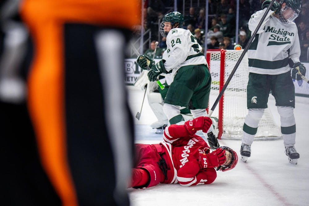 <p>Wisconsin forward Tyson Dyck (16) lies injured during a game against Michigan State at Munn Ice Arena in East Lansing, Mich., on Saturday, Nov. 22, 2025.</p>