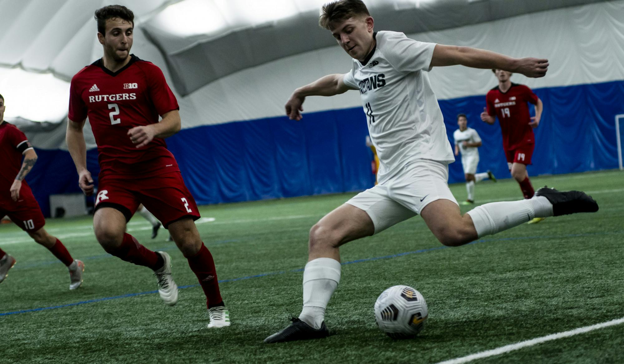 <p>Sophomore forward Gianni Ferri shoots the ball during the game against Rutgers on Feb. 19, at the St. Joe&#x27;s Sports Dome. The Spartans lost to the Scarlet Nights 0-2.</p>