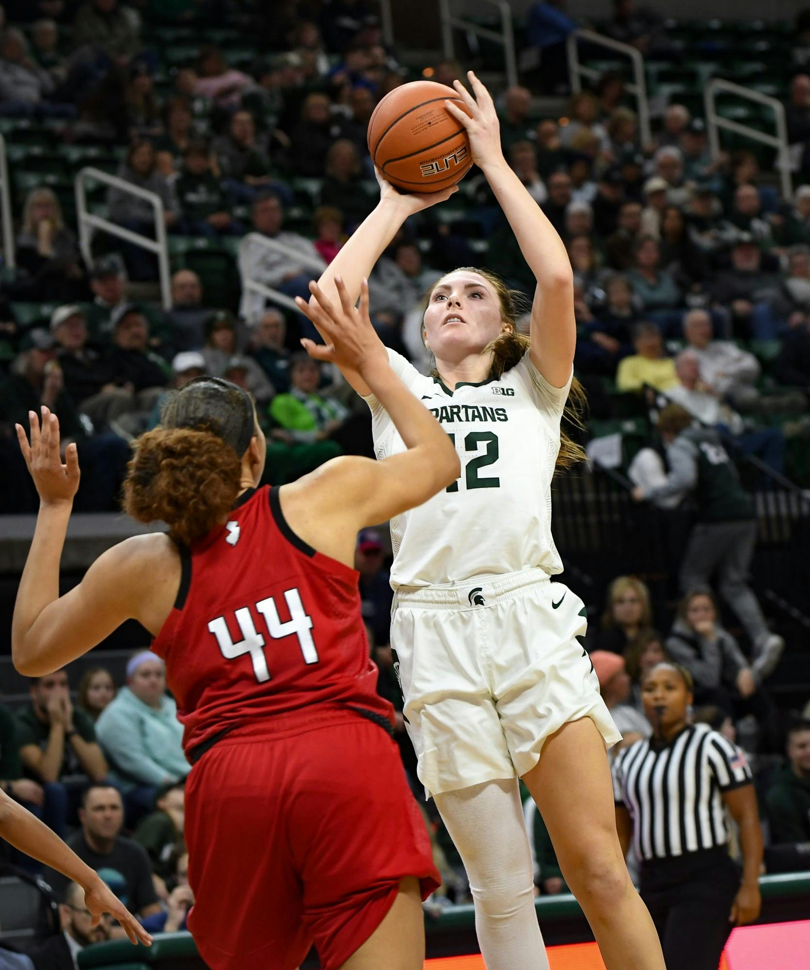 <p>Sophomore forward Kayla Belles (42) shoots over a defender during the women&#x27;s basketball game against Rutgers at the Breslin Center on Feb. 13, 2020. The Spartans ended a five game losing streak and defeated the Scarlet Knights, 57-53. </p>