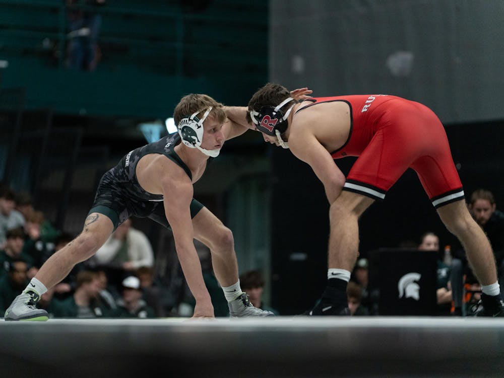 Redshirt sophomore Caleb Weiand battles a Rutgers opponent during the dual match at Jenison Field house on Feb. 13, 2026.