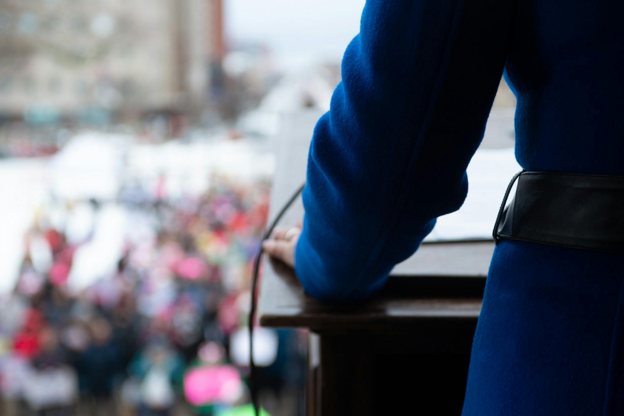 <p>Governor Gretchen Whitmer steps up to the podium to speak during the 2020 Lansing Women’s March on Jan. 18.</p>