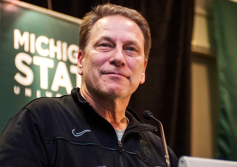 	<p>Head coach Tom Izzo smiles while looking at the crowd of Spartan fans during a pep rally before the game Friday, March. 29, 2013, at The Westin Indianapolis in Indianapolis, Ind. The Spartans will play the Duke Blue Devils in the fourth round of the <span class="caps">NCAA</span> Tournament. Adam Toolin/The State News</p>