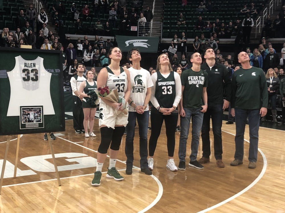 <p>Senior center Jenna Allen (33) is honored during senior night at the Breslin Center. The Spartans went on to defeat the Wolverines 74-64.&nbsp;</p>