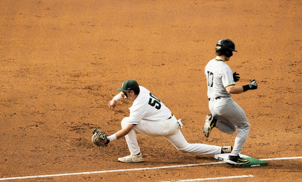 <p>Michigan State senior outfielder/infielder Will Shannon (50) catches the ball before University of Oregon junior infielder/outfielder Drew Smith (17) reaches first base at McLane Stadium on May 2, 2025. Michigan State defeated the University of Oregon 2-0.</p>