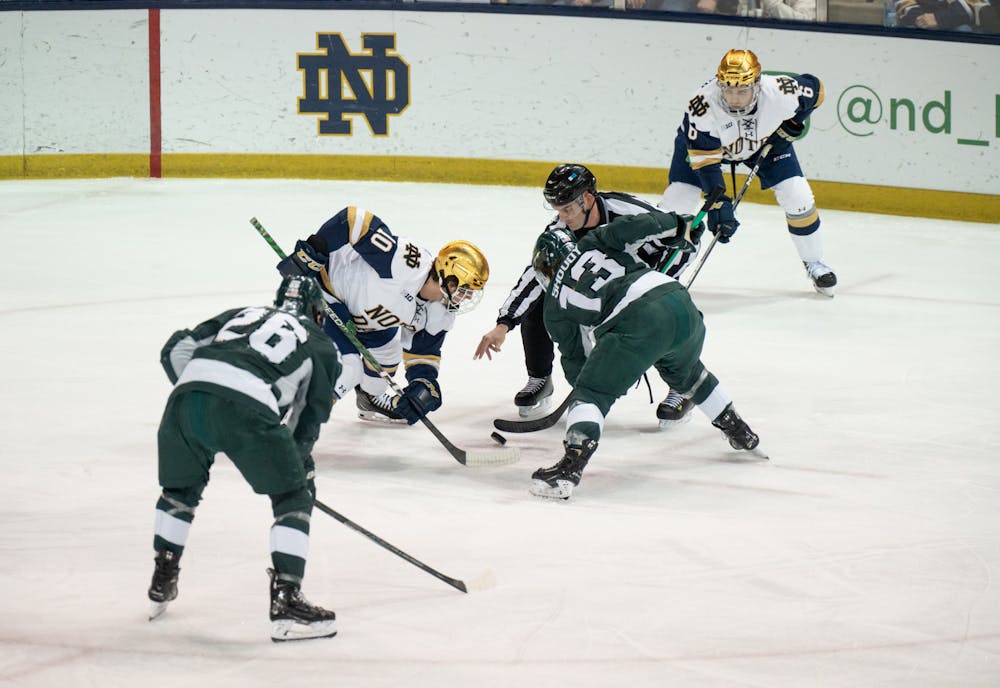 <p>Notre Dame sophomore forward Hunter Strand faces off against MSU freshman forward Tiernan Shoudy on Saturday, March 4, at the Compton Family Ice Arena in Notre Dame, IN. The Saturday evening matchup was the second of the series after MSU fell 1-0 to Notre Dame the previous night.</p>