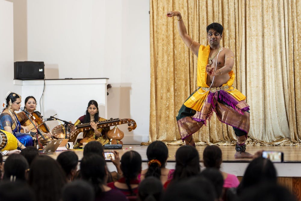 <p>Abhinav Anand portrays the sun riding the chariot driven by the seven horses from Hindi mythology during the Shivaratri festival at the Sri Sharadamba Temple in Farmington Hills, Mich., on March 8, 2026. “The idea is to show you personify the sun and then you show what he is doing,” he said.</p>