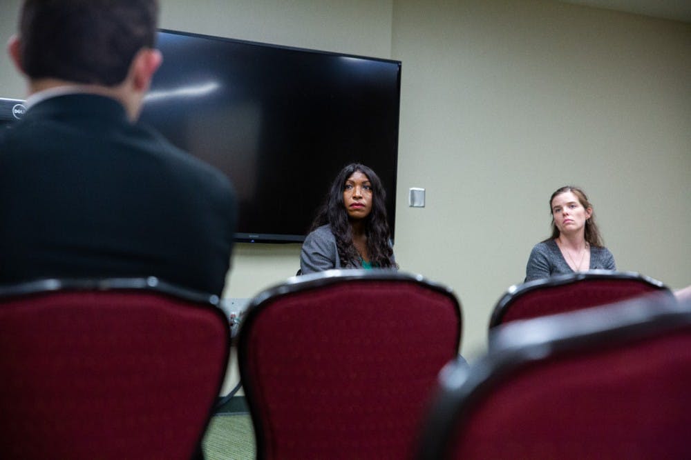 Trustees Brianna T. Scott and Kelly Tebay listen during a campus town hall meeting on Sept. 23, 2019 in the MSU Union.